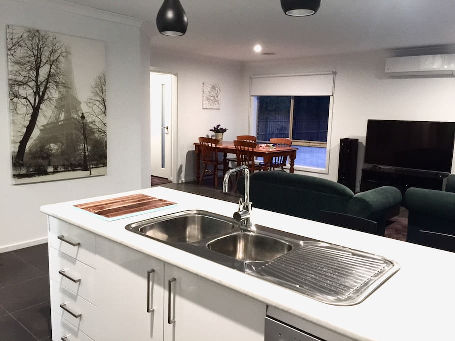 Kitchen features gas stove and oven, microwave, full size refrigerator, kettle, toaster, WIP, Brita water filter and coffee plunger.