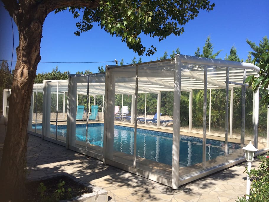 Pool with conservatory cover