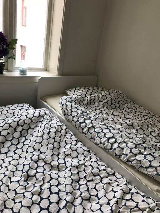 Two 90 beds that you can put together when you don’t use it to get more space in the room.