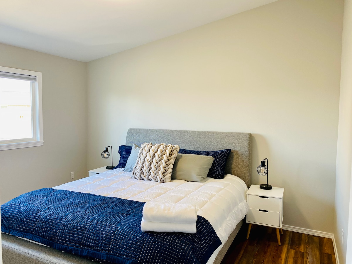 King size bed private attached  entry to bathroom. (Art to come!) 