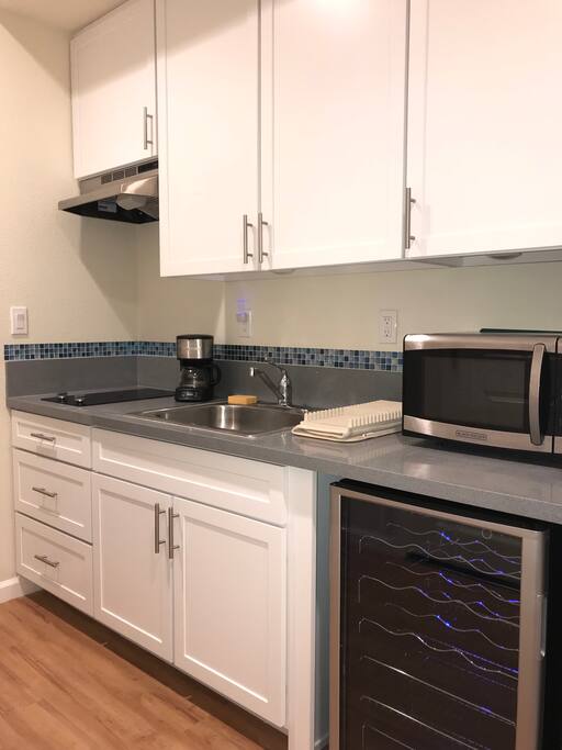 Your own kitchenette with stove, microwave, mini fridge & coffee maker!