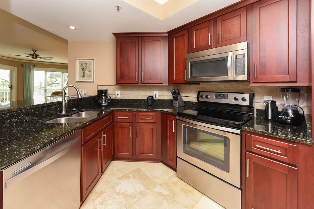 Kitchen has high end cabinetry and great storage