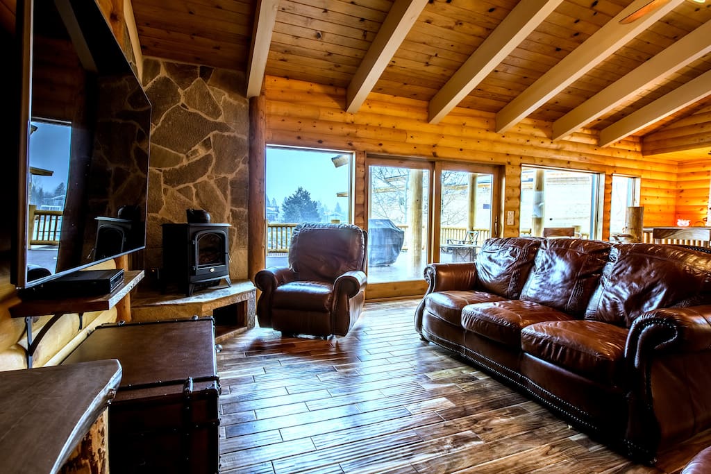 The great room: now with brand new 51" large HDTV with cable box and Blu-ray, fireplace, opens to the expansive deck outside