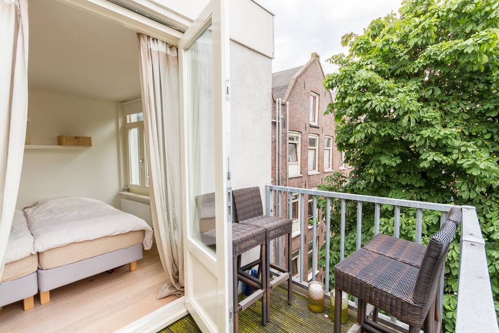 The spacious balcony will have new furniture by the time you arrive