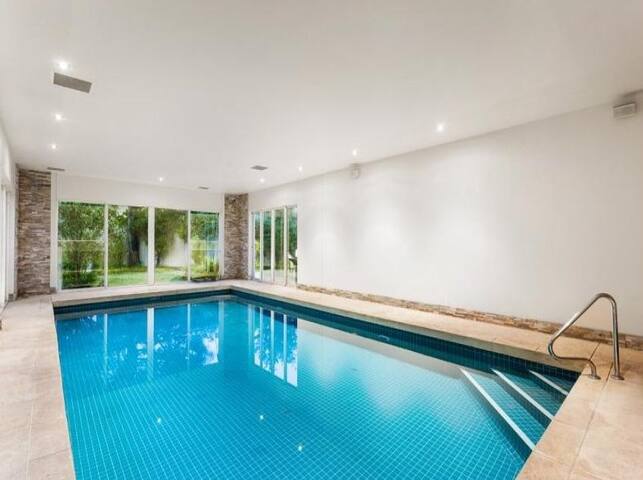 Modern luxury home with pool, spa and trampoline gallery image 2