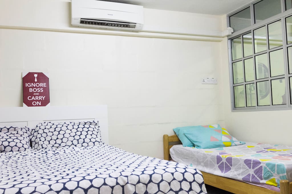 The Bedroom. Equipped with a Queen Bed and a Single Bed.