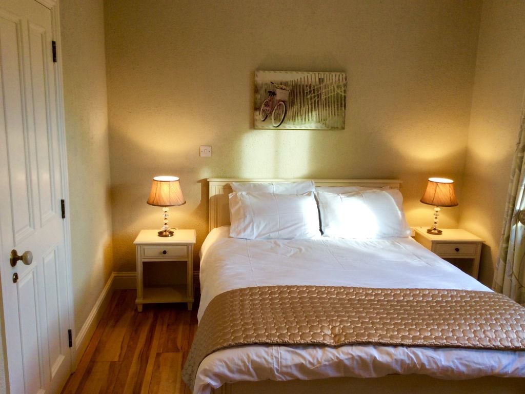 King size bed downstairs with ensuite