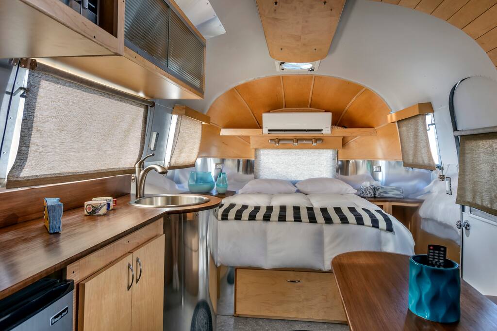 Cable TV, mini-fridge, microwave, and coffee maker are included.