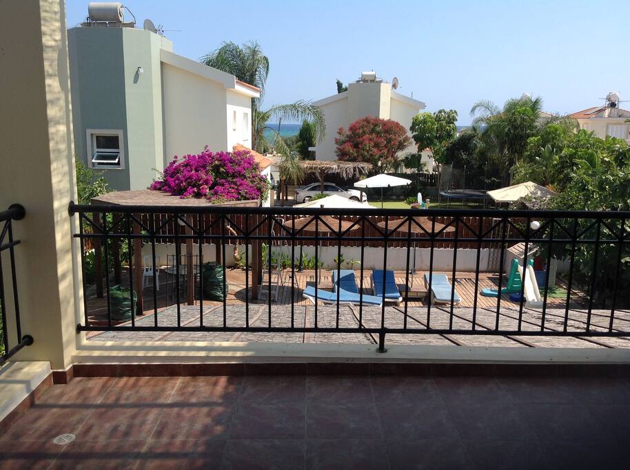 Sea view from upstairs bedrooms breezy at night cute sandy beach bay five minute walk