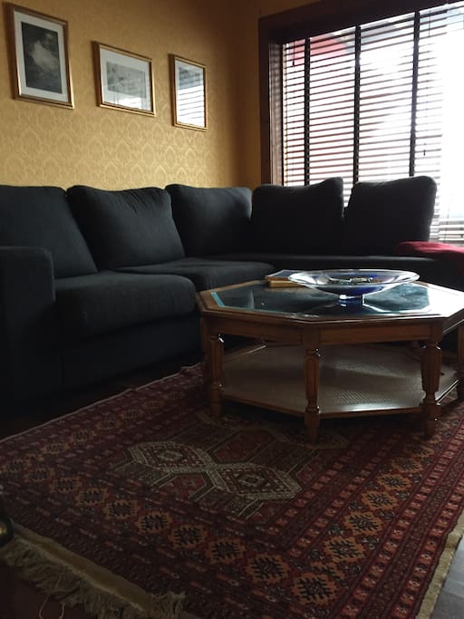 Living room with parking space outside