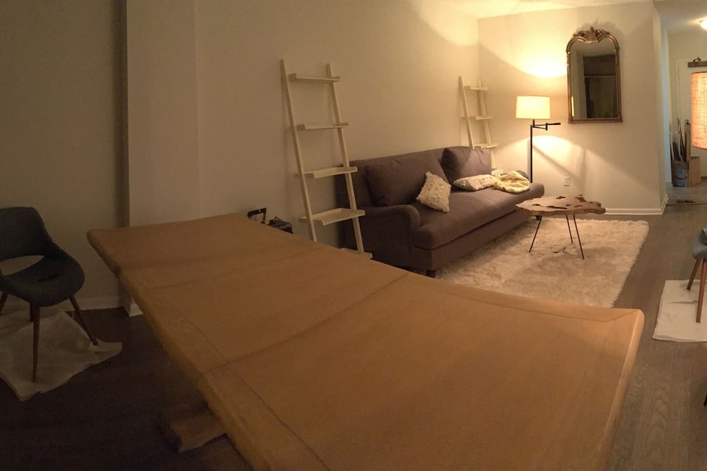 Big dining table in the living room. Suitable for working professionals too