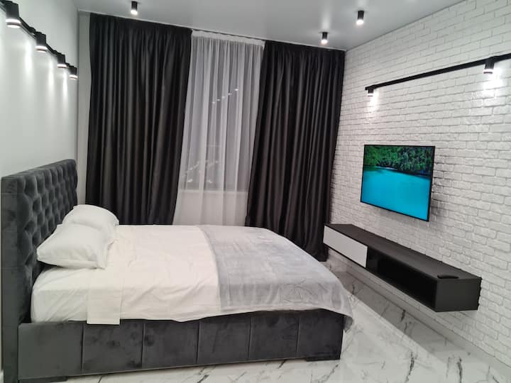 bedroom with QLED TV