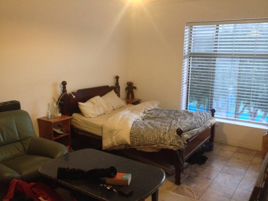 View of double bed in private room