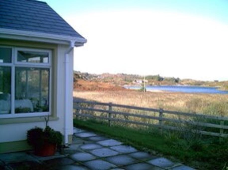 Sun room with lake view.