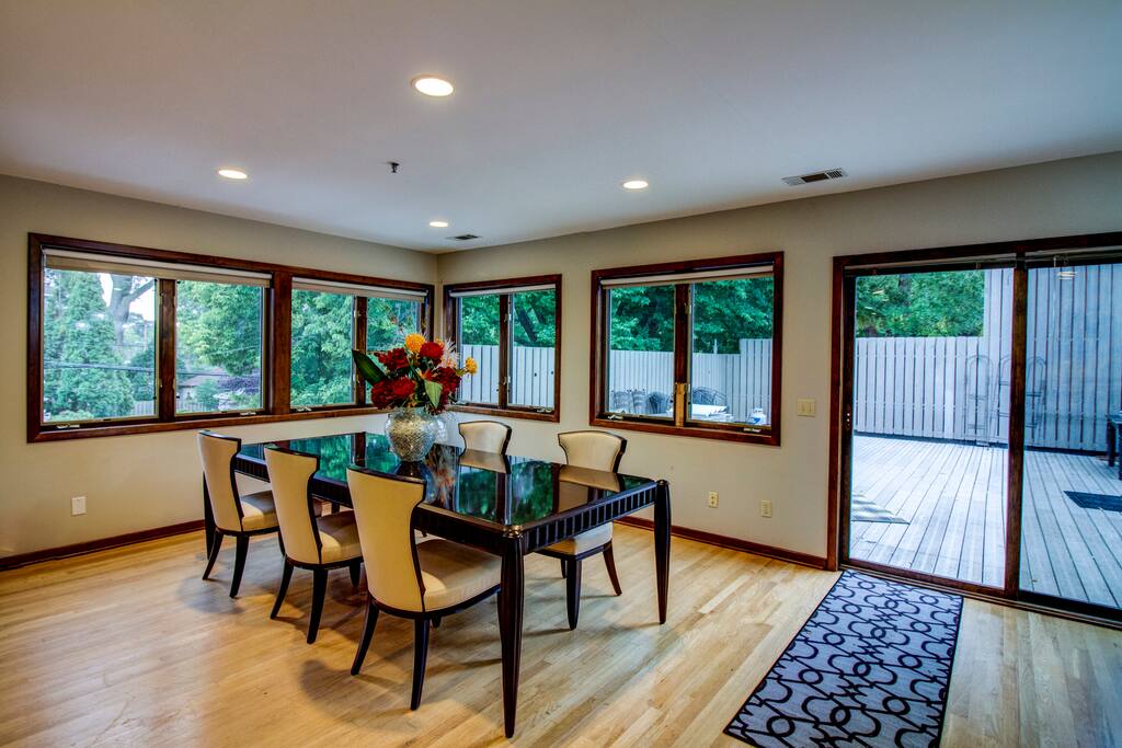 Very Large, Stunning Dining Room table.
Lots of light! Notice the sliding glass door to the outdoor patio.