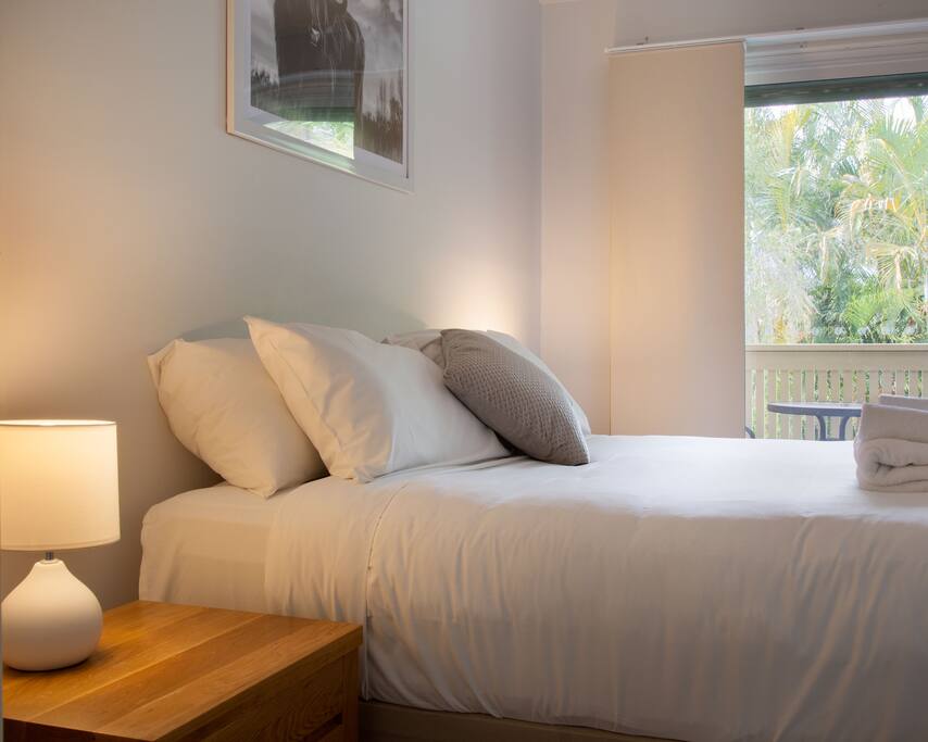 Main bedroom with a luxury hotel quality queen bed