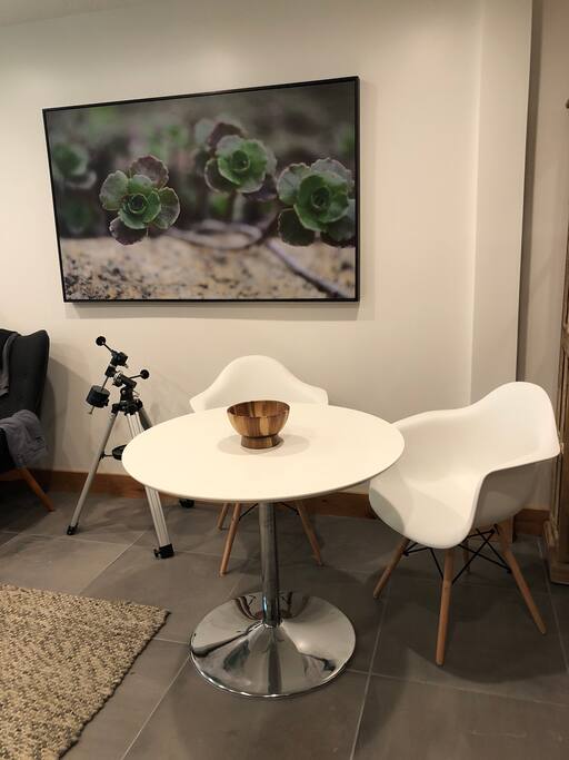 Chairs and table for eating or games.