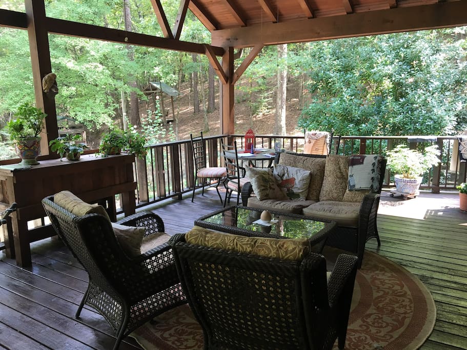Large covered porch in common area, guest use only