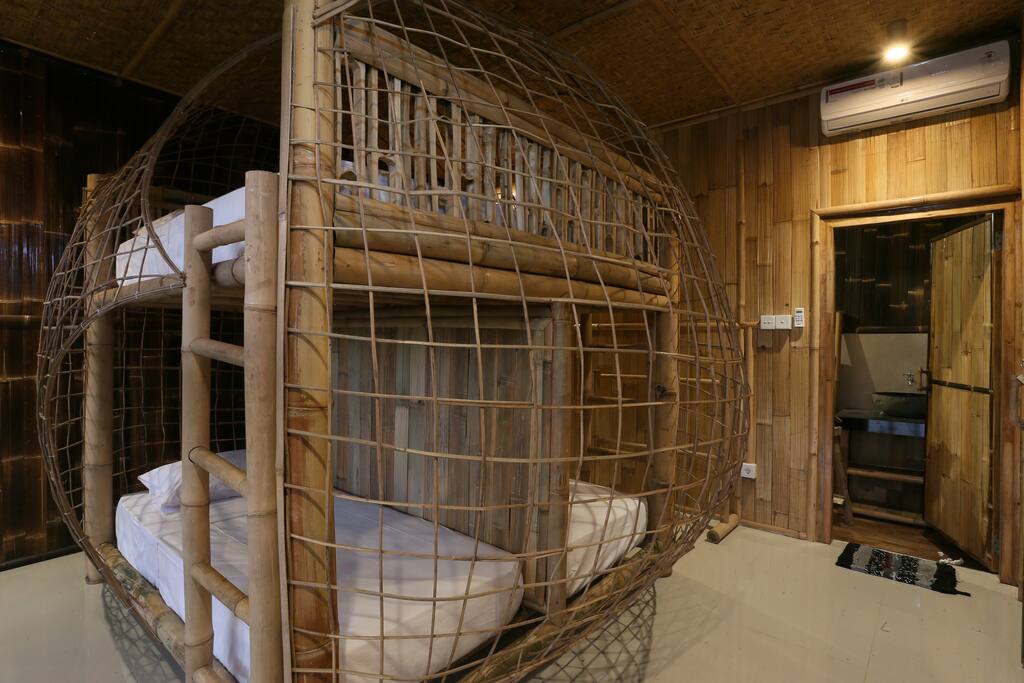 Our craftsman bunk beds offer a creative and unique experience for our guests. Enjoy the single beds on the bottom or the double bed on top. Each room can be 4 single or 2 single and 1 double bed