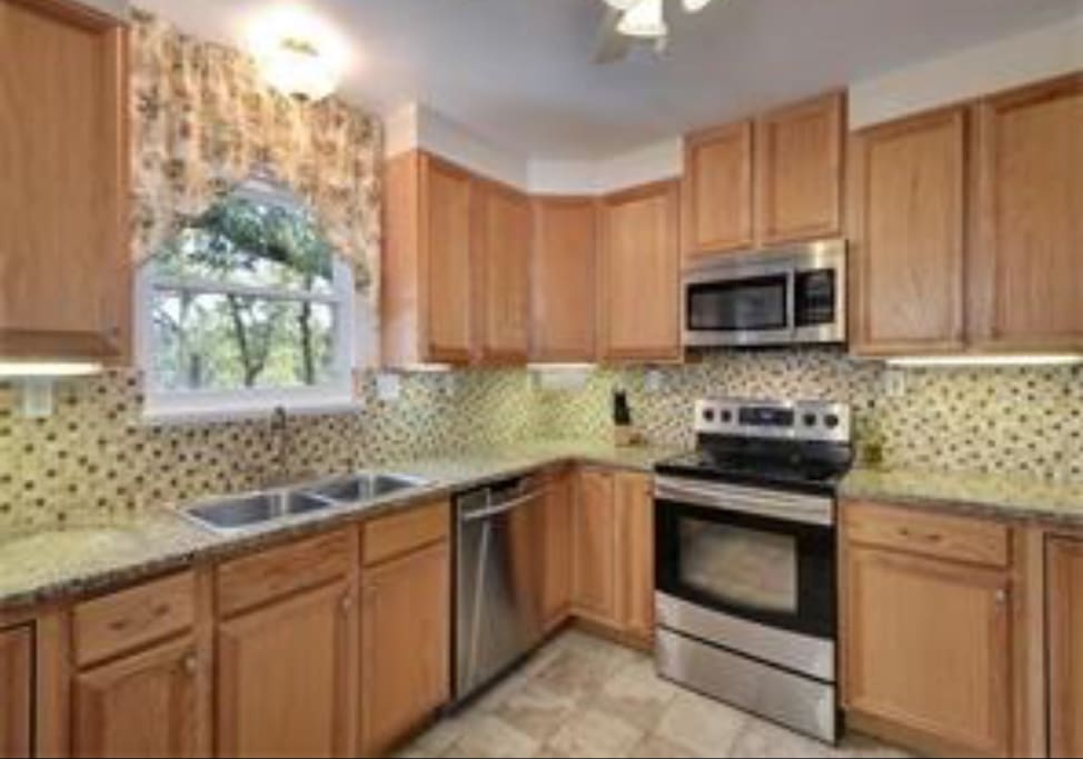 Kitchen with Granite Countertops and State of the Art Appliances
