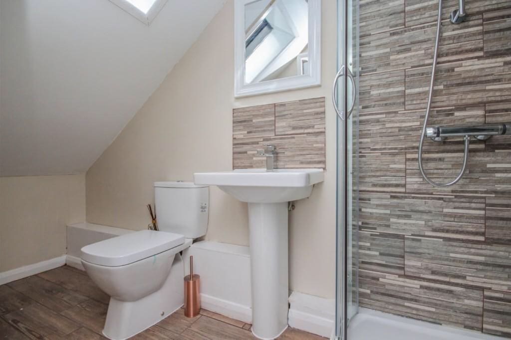 The separate toilet and shower bath