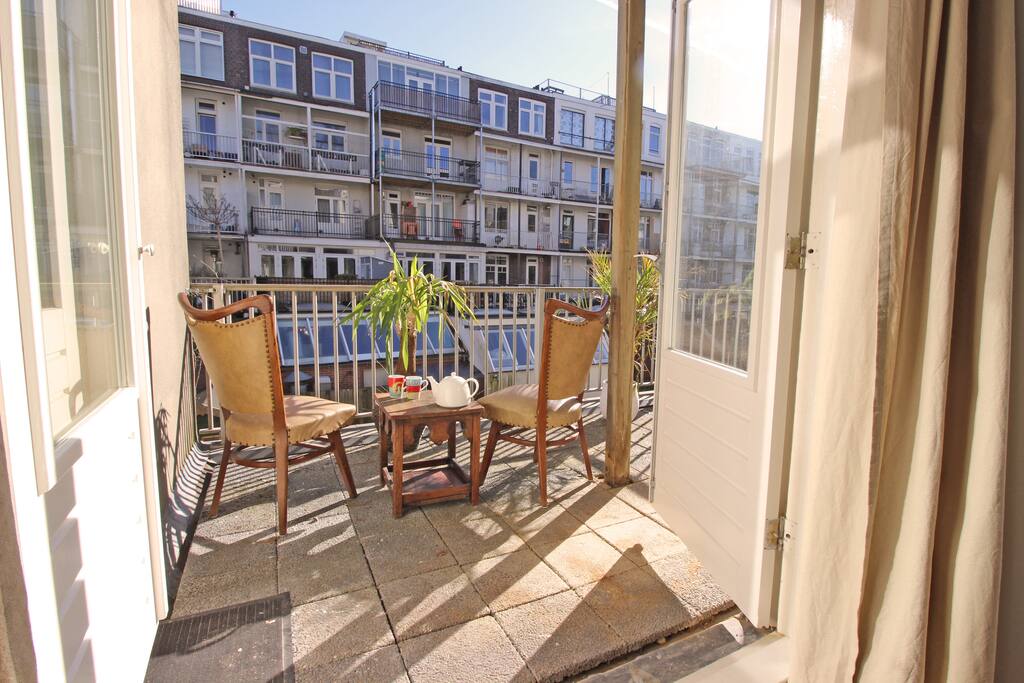 Enjoy a nice cup of coffee or tea on this great balcony!