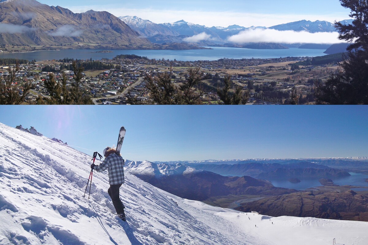 The top image captures a panoramic view of Wanaka township and the surrounding mountains, with a tranquil lake reflecting the sky. The bottom image features a skier ascending a snowy slope, showcasing the stunning alpine landscape with visible mountains and valleys in the background.