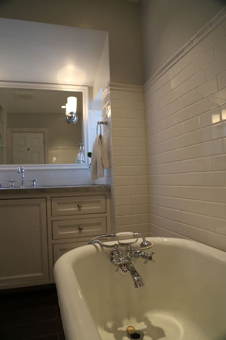 Claw foot tub in second floor bathroom
