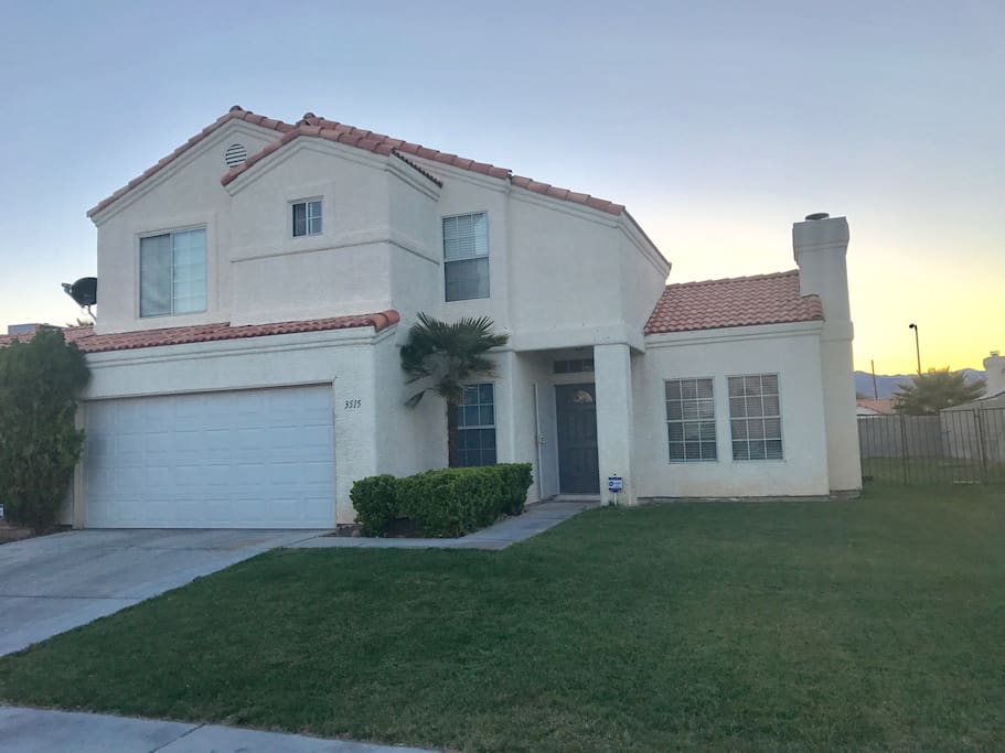 Family friendly 2-story home away from home. Home has a huge front and back yard with beautiful green grass. Hassle free key code entry system allows for easy access.