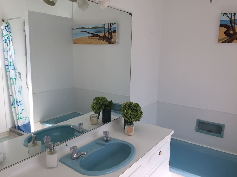 Your personal bathroom and toilet are part of the main house, separated from your room by a covered garage.