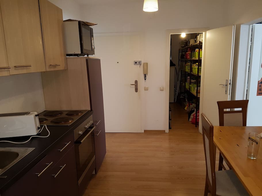 kitchen/shared room , white door is the entrance to the flat