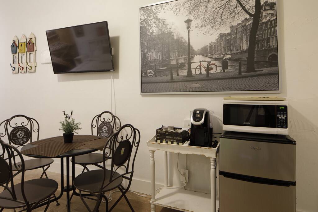 New 1080 LED TV, microwave, mini-refrigerator and dining table
