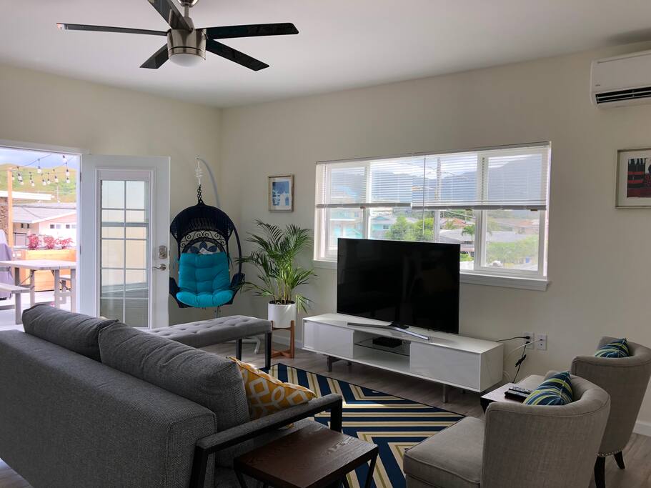 Living room also includes a swingasan hanging chair where you can enjoy a good book!