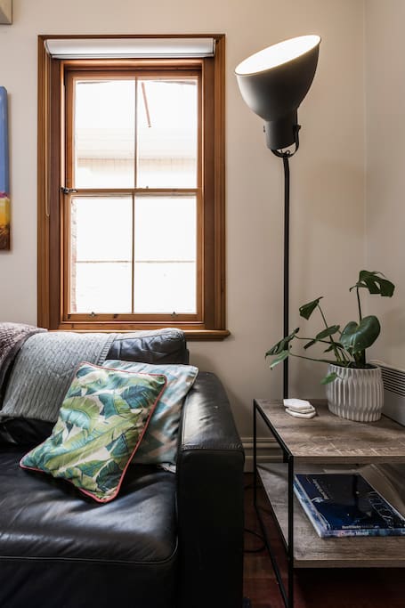 Light and bright living room, with stunning greenery.