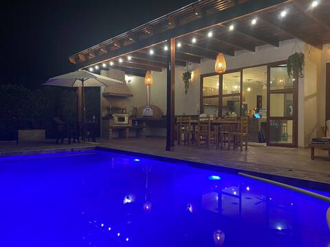 Cheerful cottage with a pool and campfire