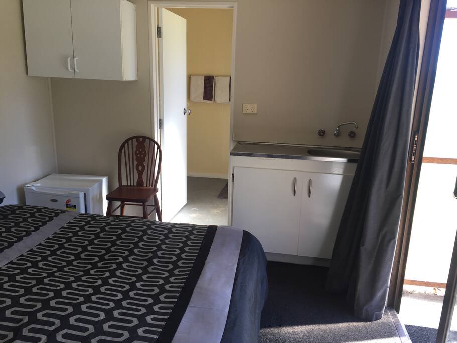 bedroom/kitchenette - mini fridge, tea, coffee, hot water, electric jug