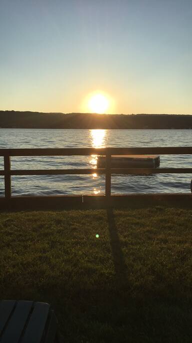 Beautiful setting sun on Keuka. Also a picture of the raft... Picture taken while relaxing in the chairs in the front yard!