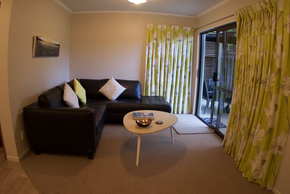 Enjoy morning sun across lawn into the lounge.