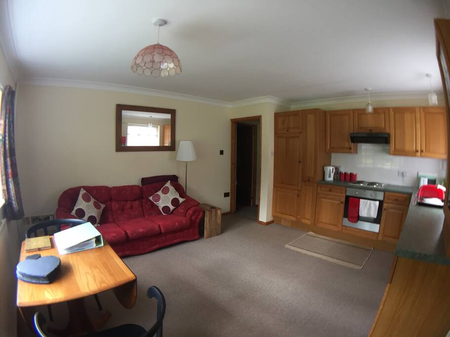A lovely large lounge and kitchen area to relax in during your stay
