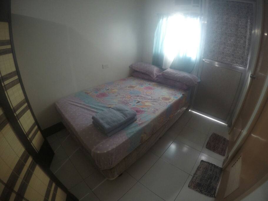 Twin bed with 4 pillows, complimentary use of towels and blankets