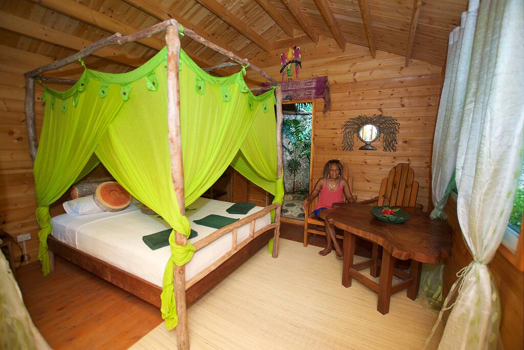 All quality locally made hardwood furniture includes four poster bed & silk mozzie nets, adirondack chairs and unique slab tables