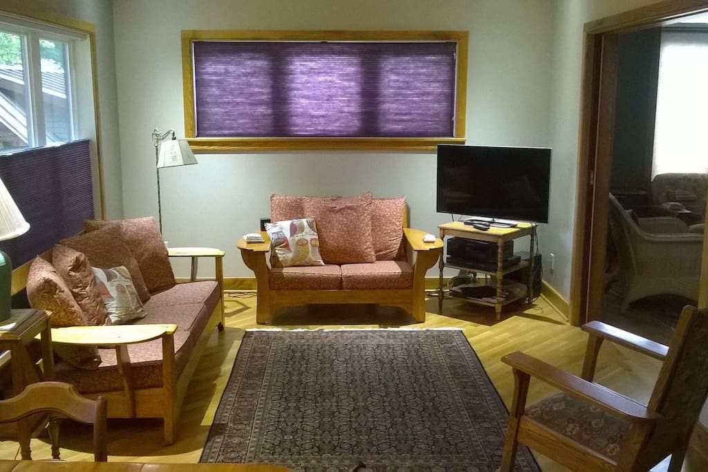 TV room- open to dining room and kitchen with island bar seats