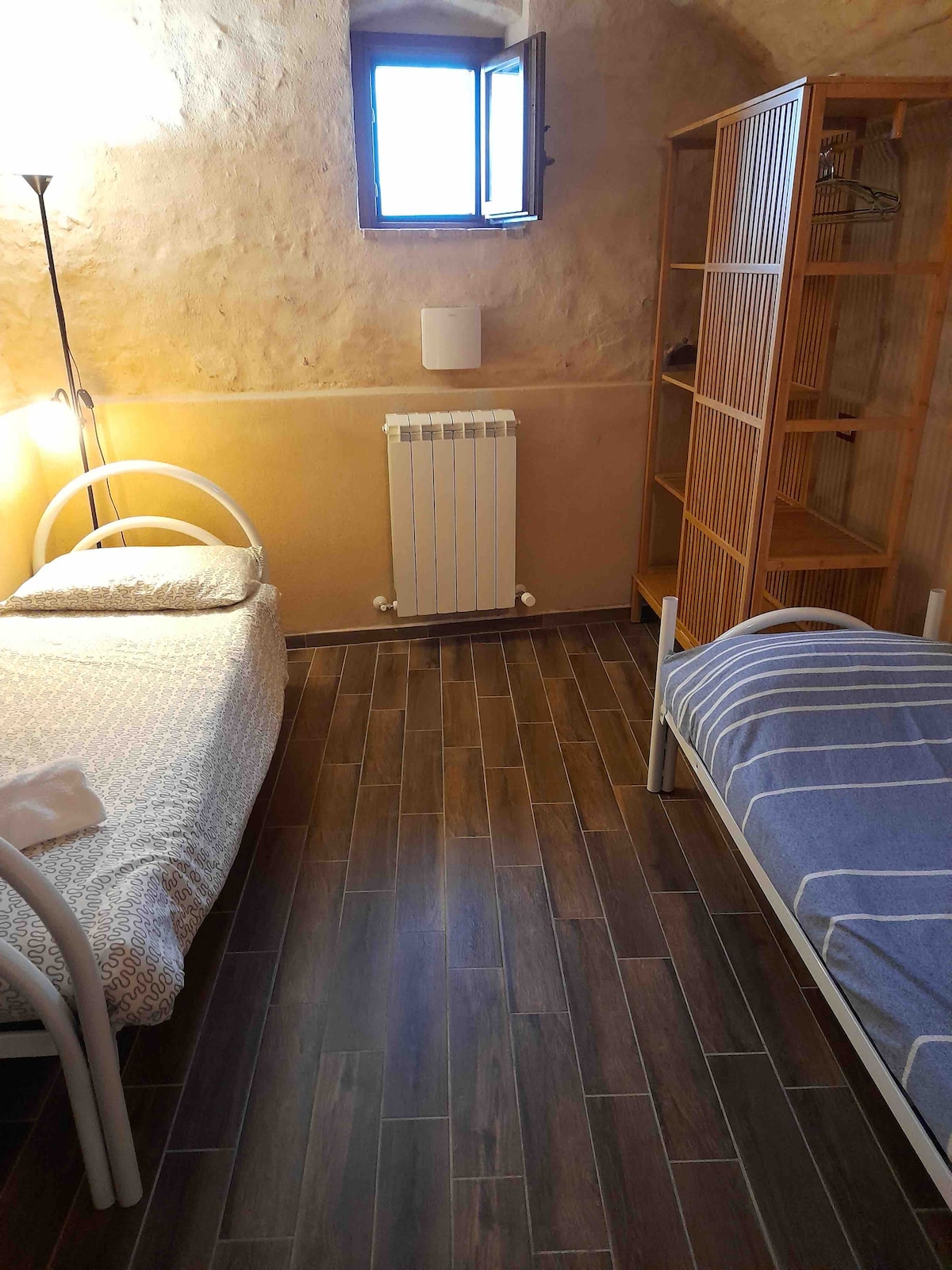 The twin bed quickly converts to bunk beds if the little ones want to try that out. Plenty of shelves to avoid clutter and separate aircon for summer days.