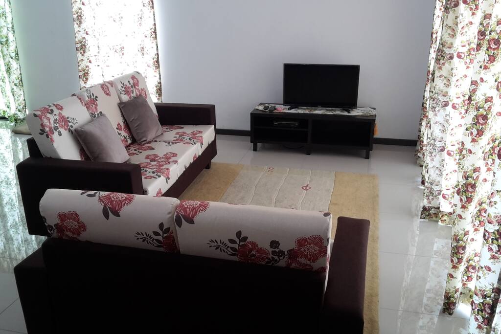 Living room with flat-screen TV and Enjoi