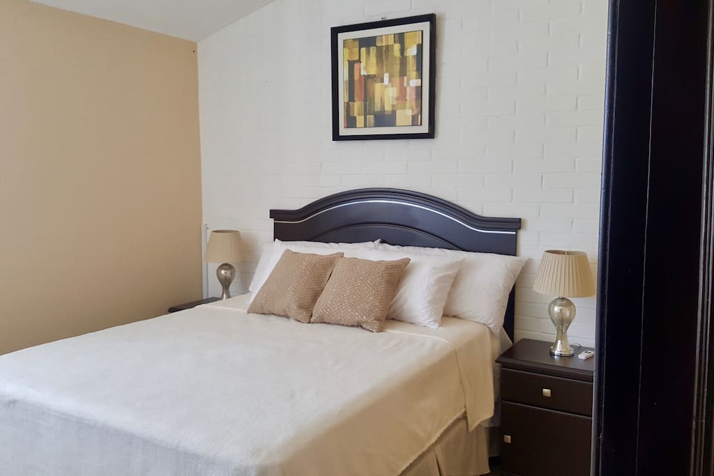 Dormitorio principal cama Queen confortable