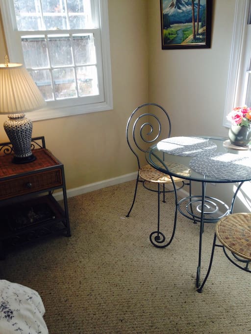 Bistro table for coffee or laptop.