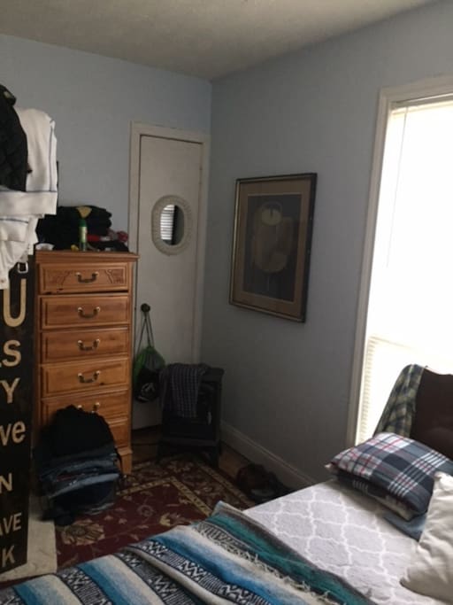 Closet and chest of drawers and heater, should the weather get too cool.