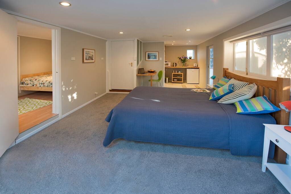 main room with kitchenette in the back