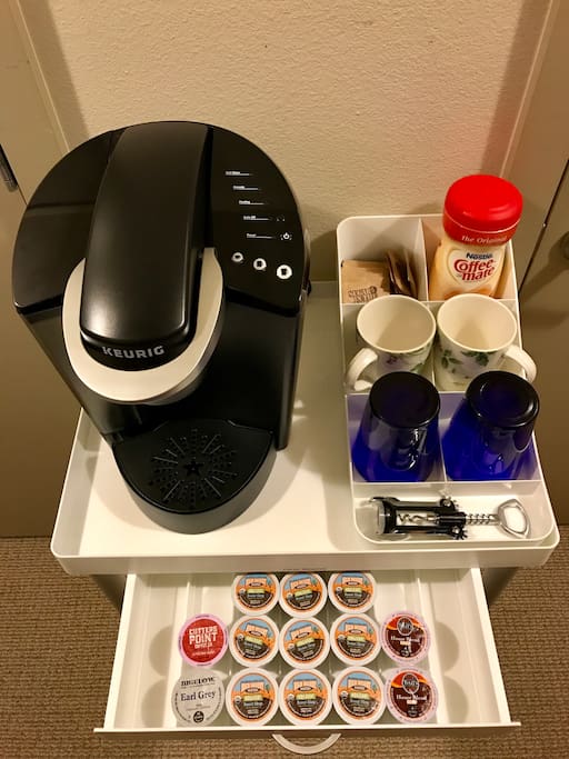 Enjoy a cup of coffee in the morning! Sugar in the Raw packets and unflavored powdered Coffee Mate creamer provided.