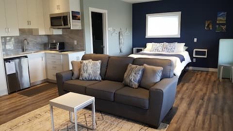 Top Airbnb: West Edge - private, cozy, mountain view suite. in Cochrane